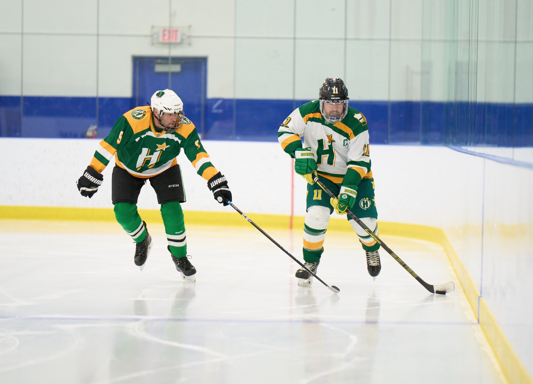 Hockey players skating